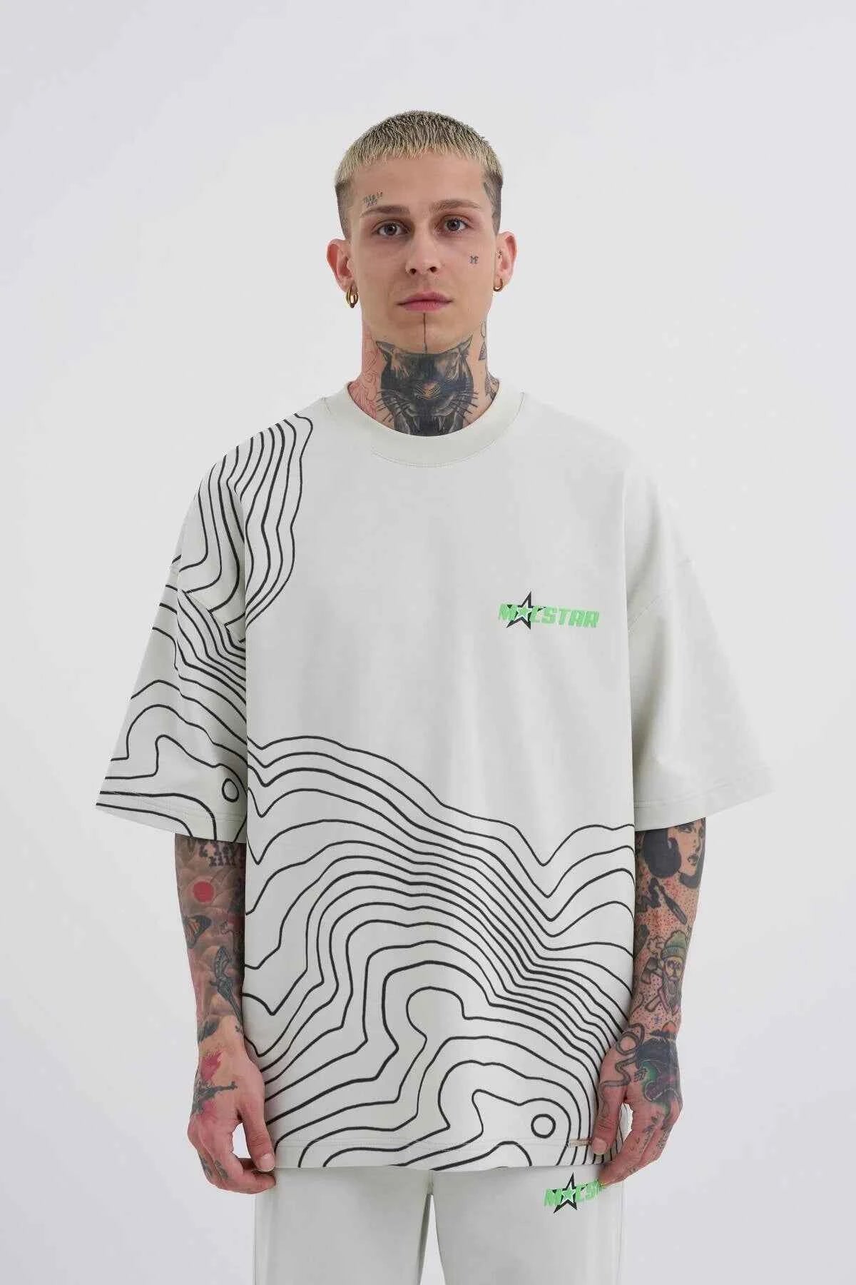 Men's oversize white T-shirt with black contour stripes and green chest logo