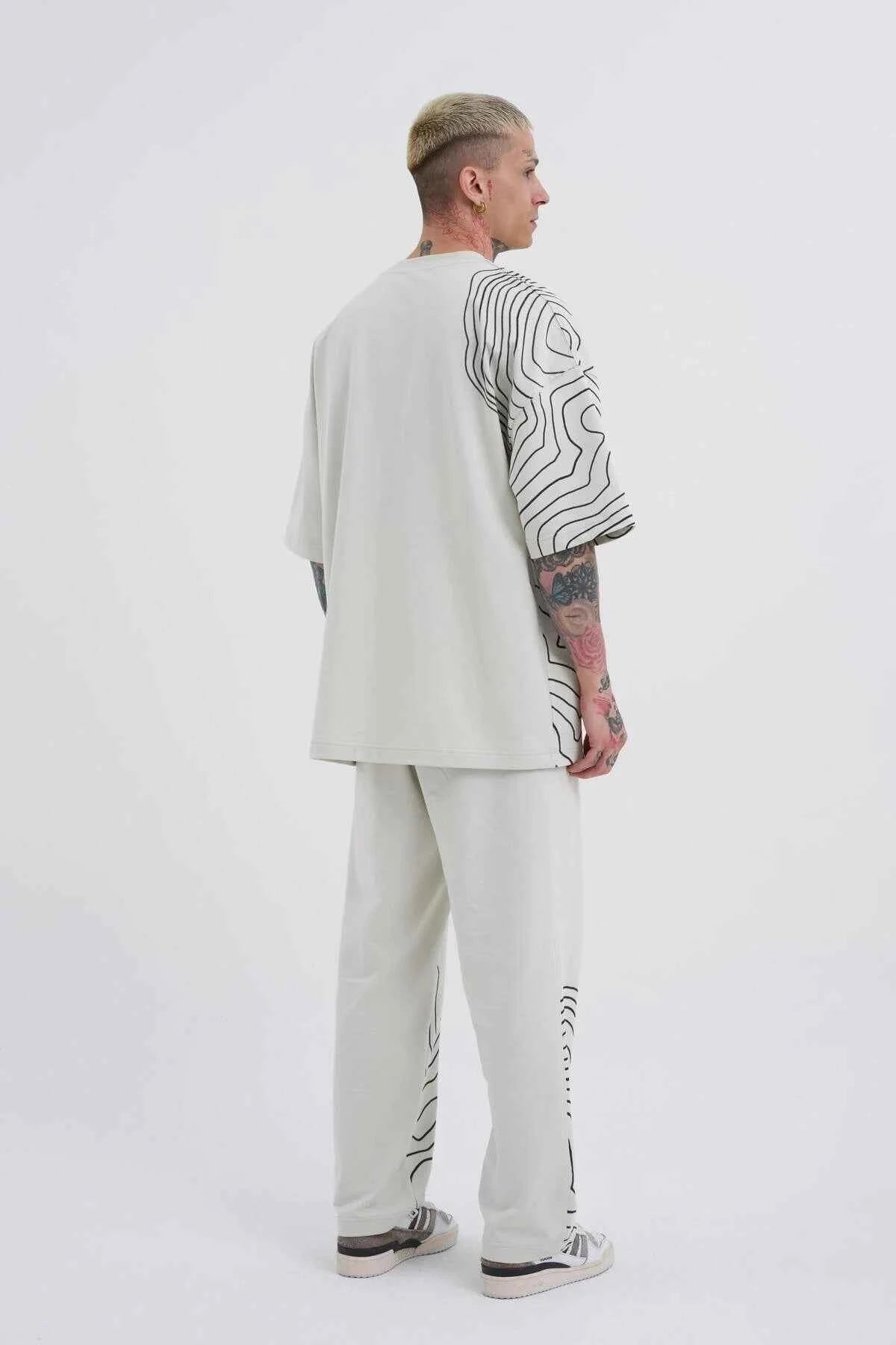 Men's oversize white T-shirt back view with black contour stripes