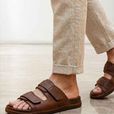Tan slide sandals for men with two adjustable straps and textured sole