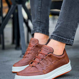 Men's tan low-top lace-up sneakers with white sole