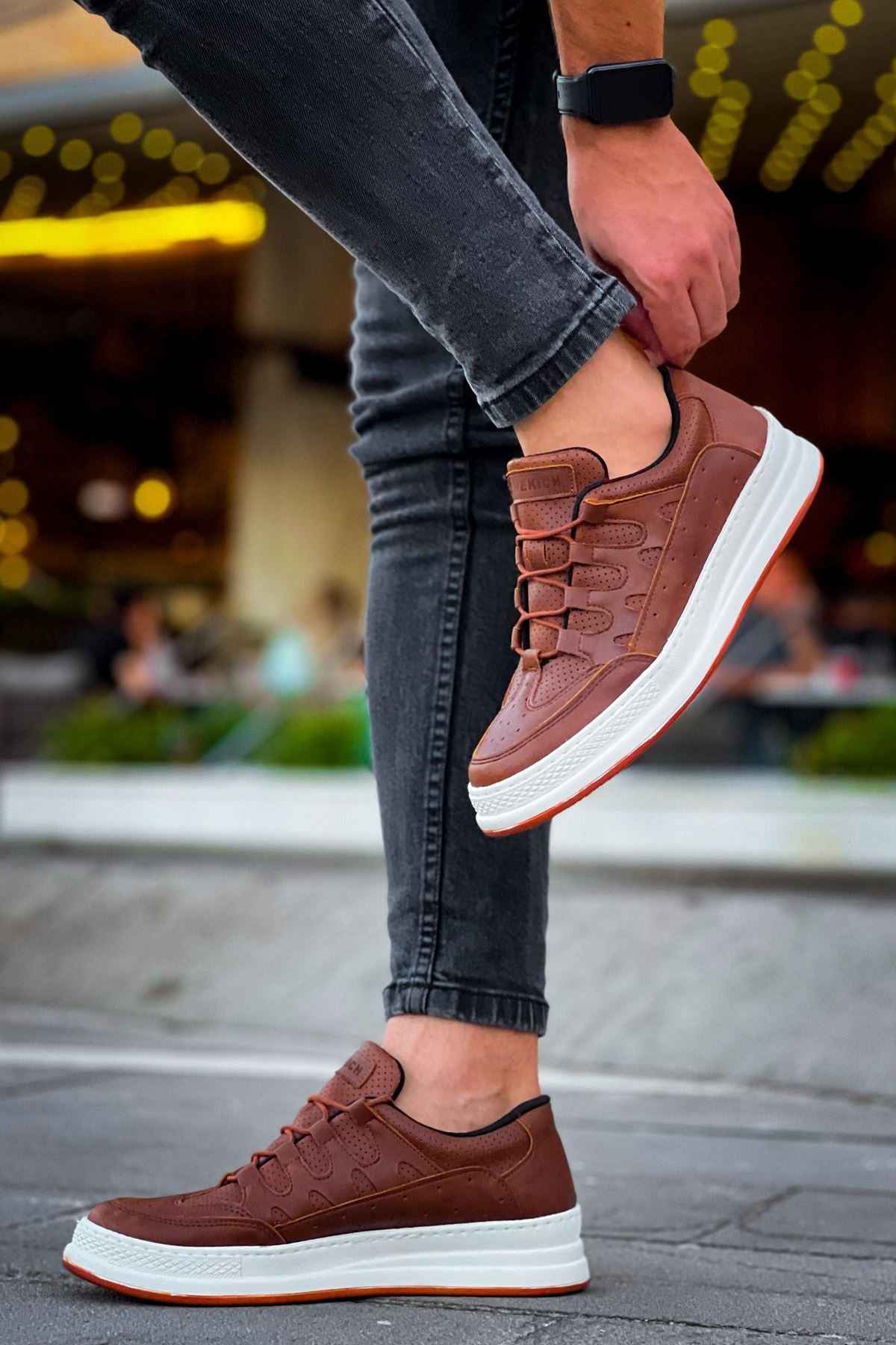 Men's tan lace-up sneakers, side view, white rubber sole