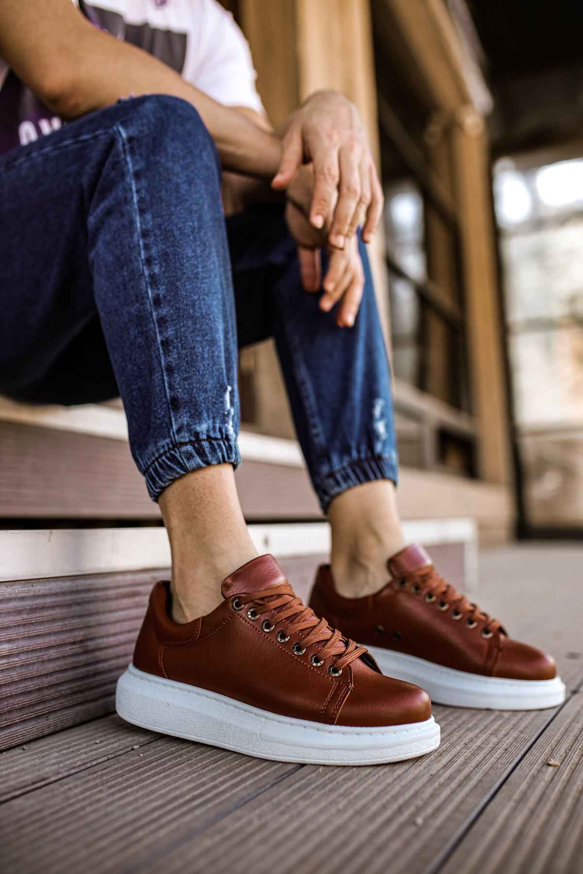 Apollo men's tan lace-up sneakers with white rubber sole and brown stitching detail