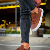 Lix tan lace-up sneakers, perforated upper and white rubber sole, side angle