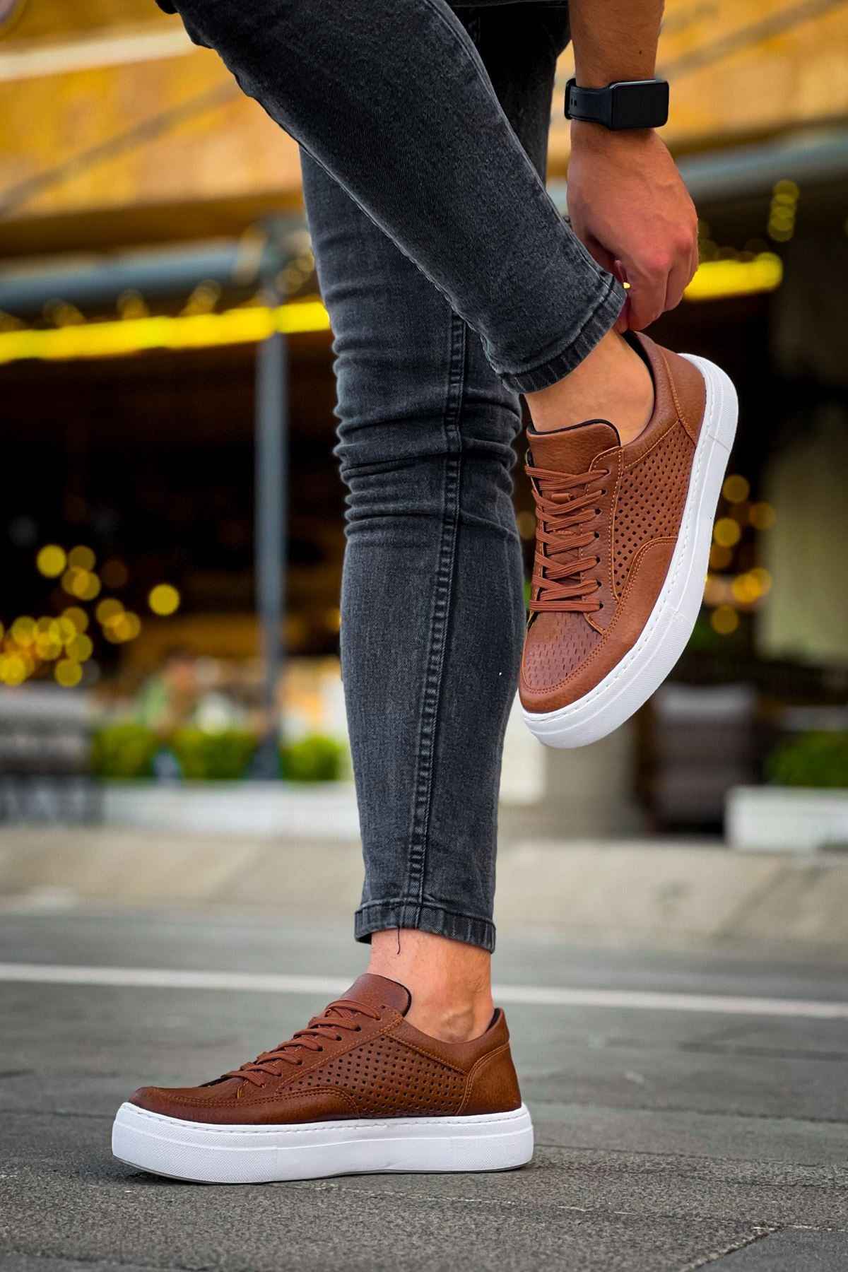Lix tan lace-up sneakers, perforated upper and white rubber sole, side angle