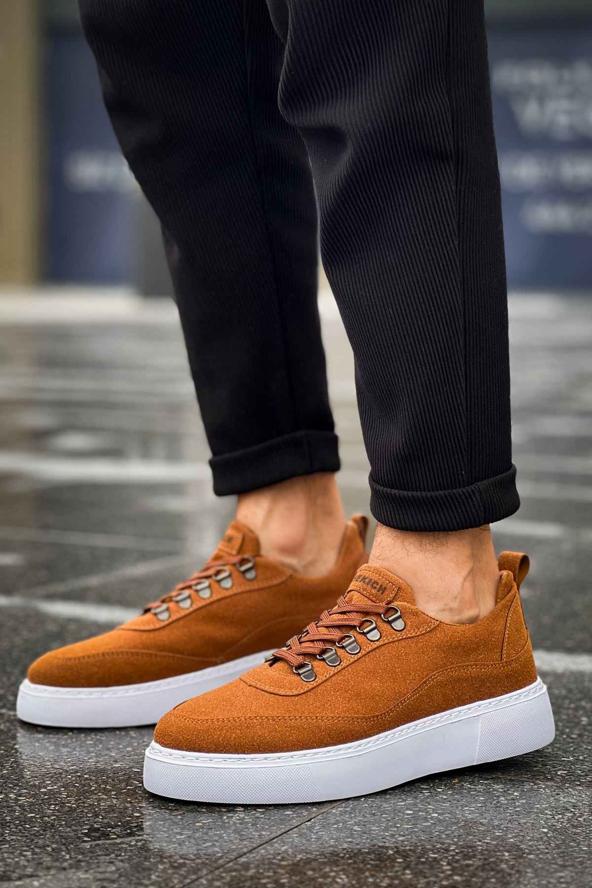 Tan suede sneakers side view, lace-up with metal eyelets and white sole