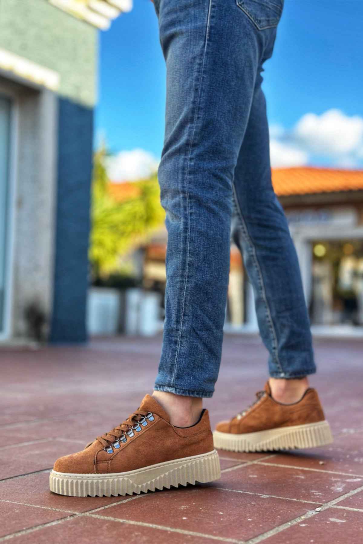 Men's tan suede lace-up sneakers with chunky off-white rubber sole