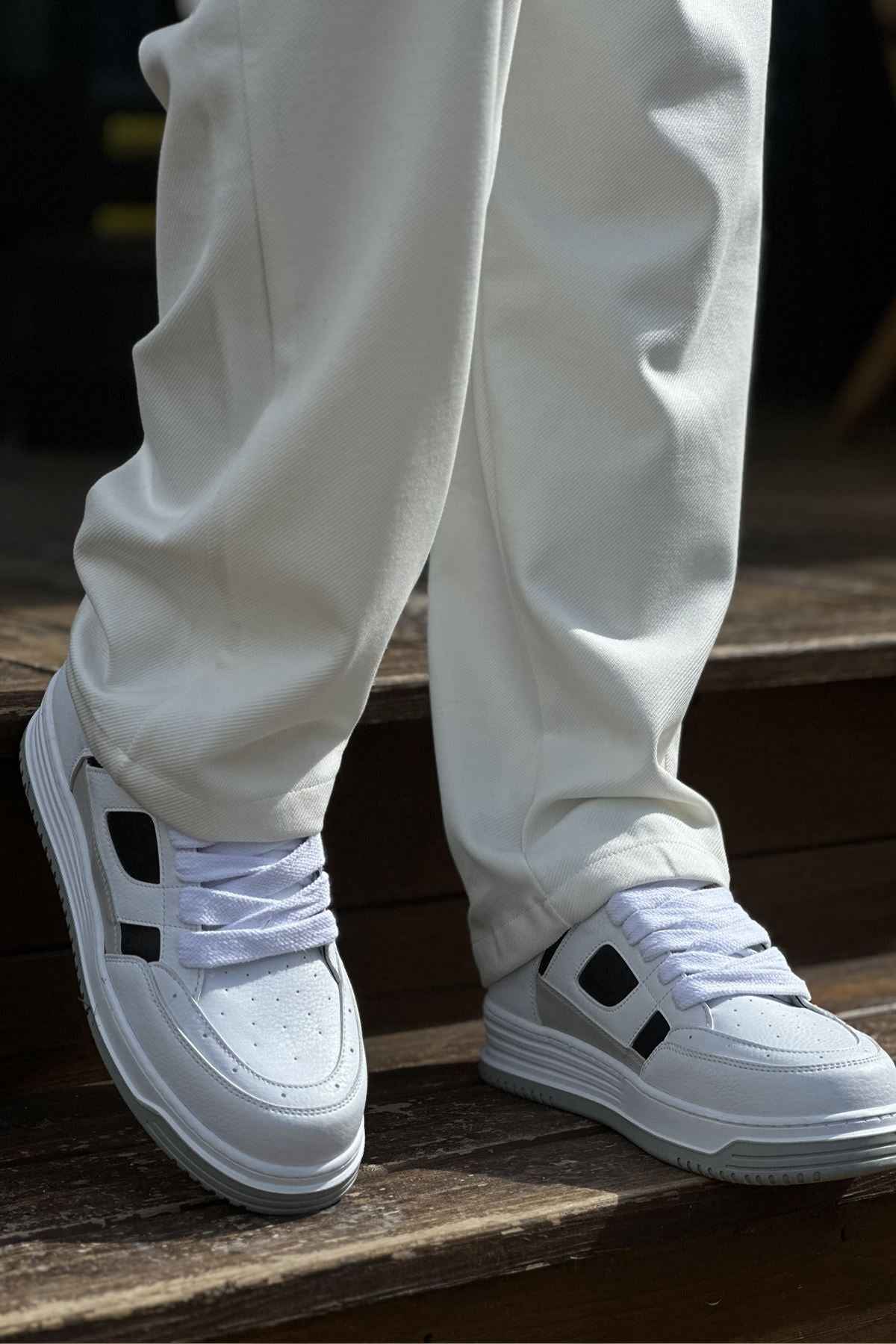 Men's white lace-up sneakers with black square side accents