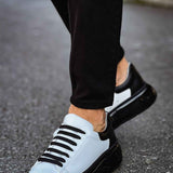 Men's two-tone sneakers, white upper with black stripe detailing and black lace-up front