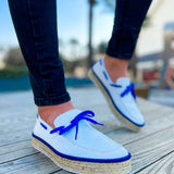 Men's white canvas espadrilles with blue laces and textured jute rope sole