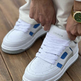 Men's white sneakers with blue side panels and white laces