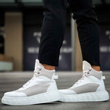 Men's white high-top lace-up boots with gray paneling and oversized sole
