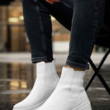 Men's white ankle boots with side elastic, chunky lug sole, side view