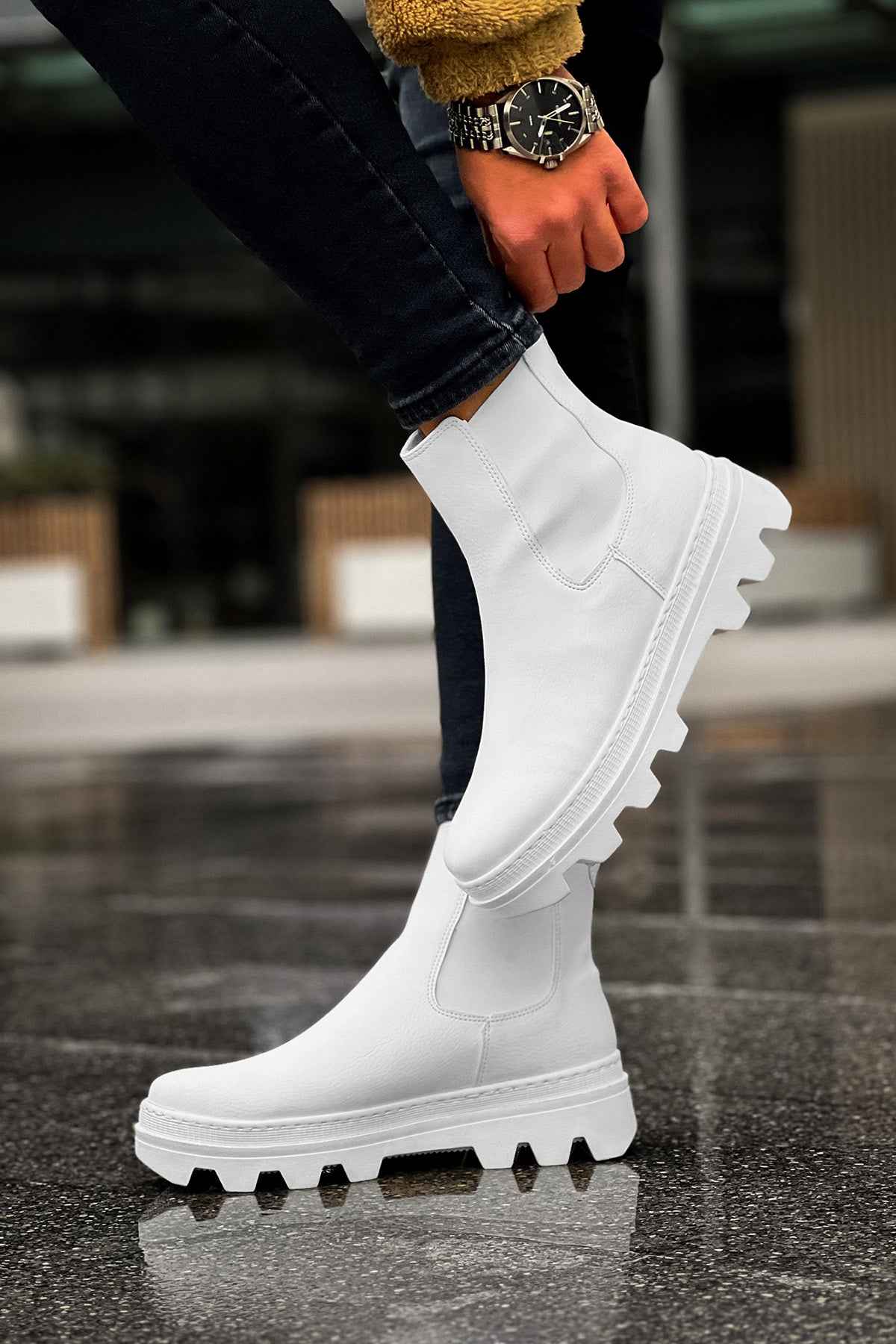 Men's white ankle boots with side elastic and lug sole, lifted foot