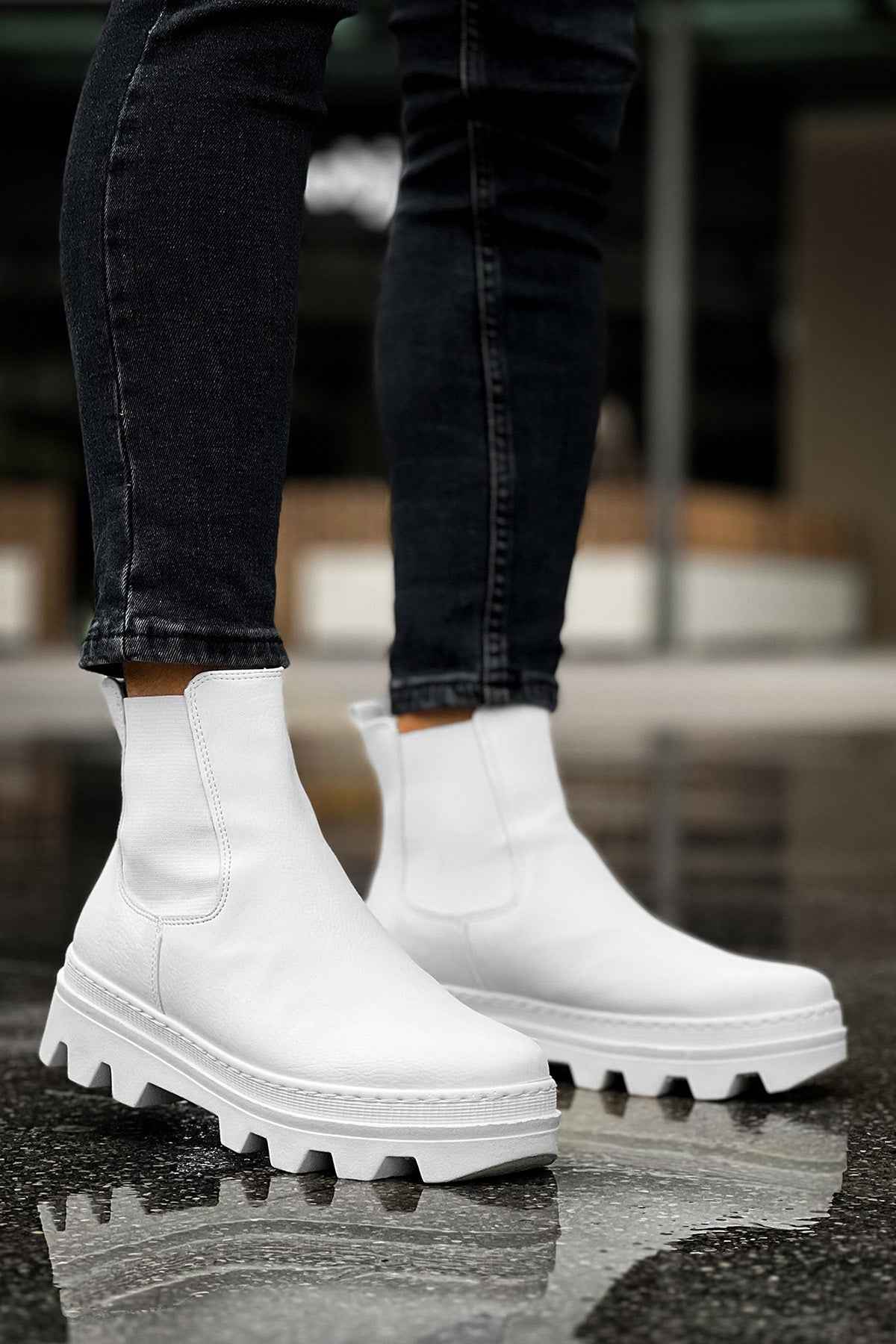 Men's white ankle boots with side elastic and lug sole, front