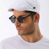 White flat cap with small side button detail