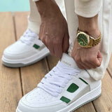 Men's white green low-top sneakers with green side panels and lace-up