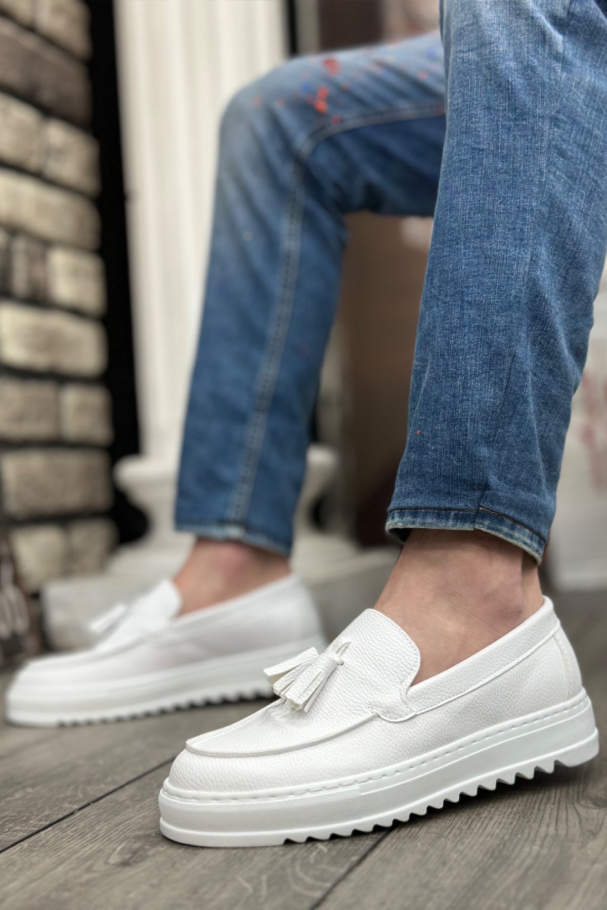 Men's white slip-on loafers with tassel and chunky sole