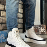 White high-top lace-up boots with black/ navy side panels and chunky rubber sole