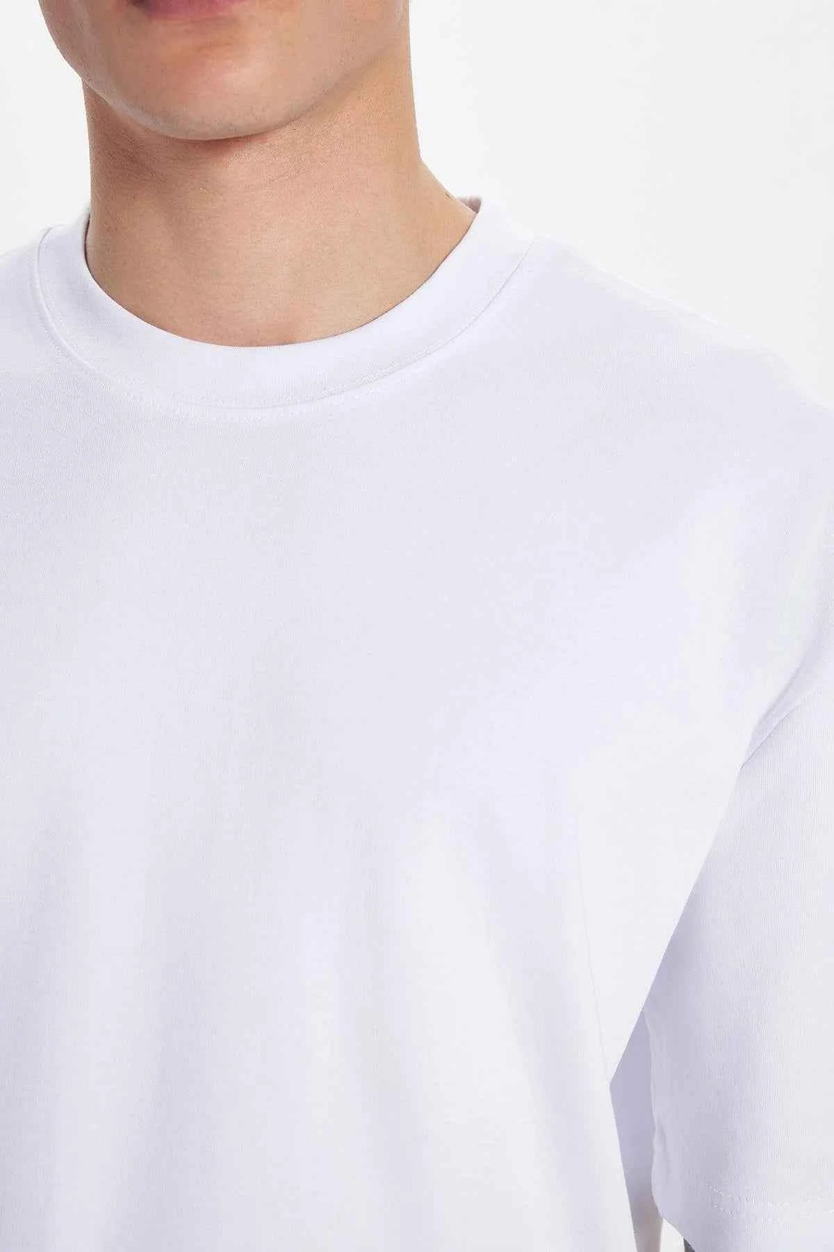 White crew-neck T-shirt collar and upper chest