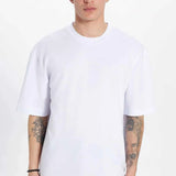 Oversize white crew-neck T-shirt with short sleeves, front view