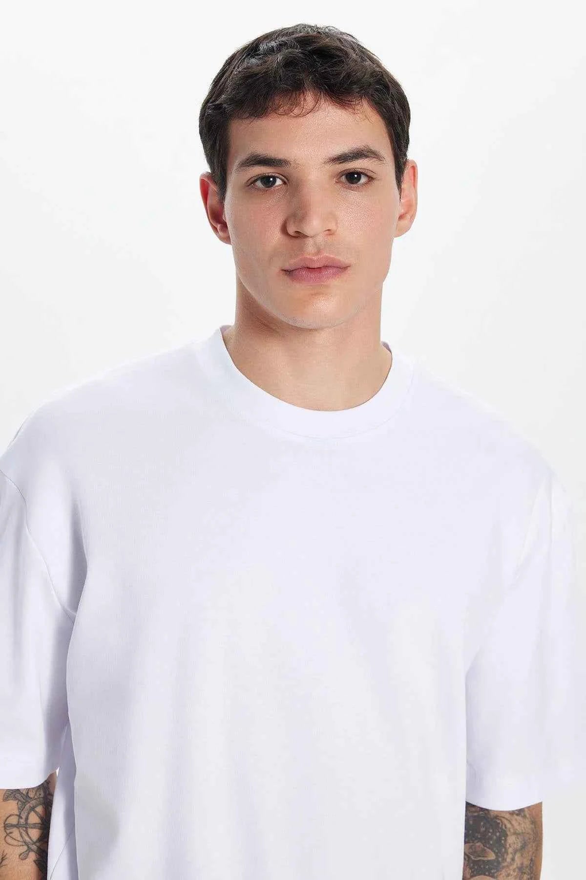 White crew-neck T-shirt close-up of chest and neckline