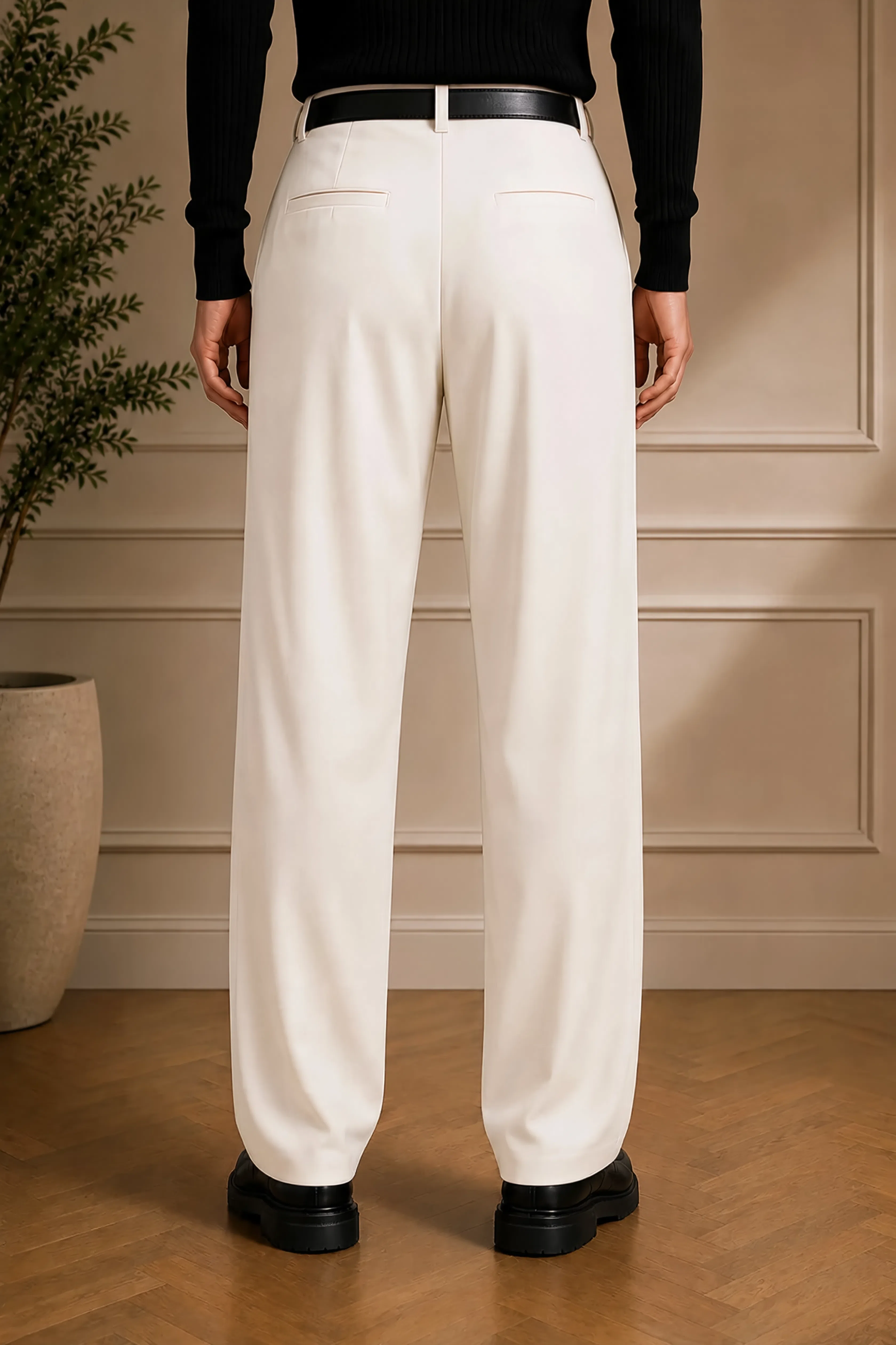 Men's white dress pants with black belt, front crease and straight legs