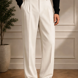 Men's white dress pants with black belt, front crease and relaxed straight fit