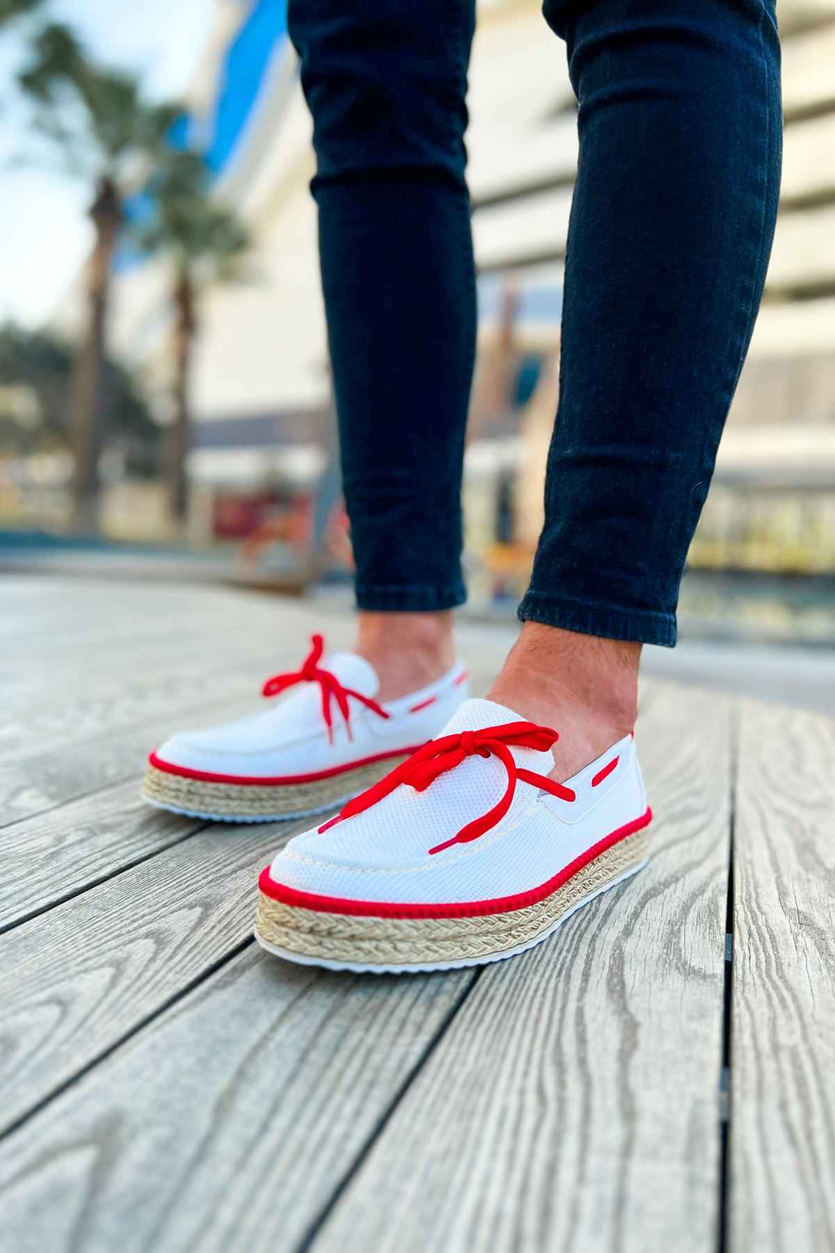 Men's white espadrille shoes with red lace-up detail and jute-textured sole
