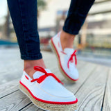 Men's white espadrille shoes with red laces and woven jute sidewall sole