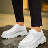 Men's white leather-style lace-up shoes with chunky tread sole, side angle