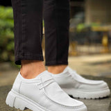 Men's white leather-style lace-up shoes, angled side view with textured sole