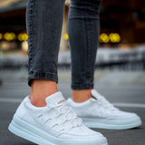 Men's white lace-up sneakers, front-quarter view with perforated panels