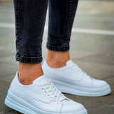 White low-top lace-up sneakers with smooth upper and rubber sole