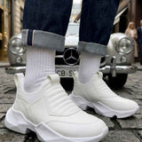 White sock sneakers with ribbed cuff and thick tread sole, side view