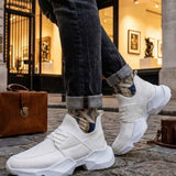 Men's white knit sneakers with chunky tread sole and pull-tab detail
