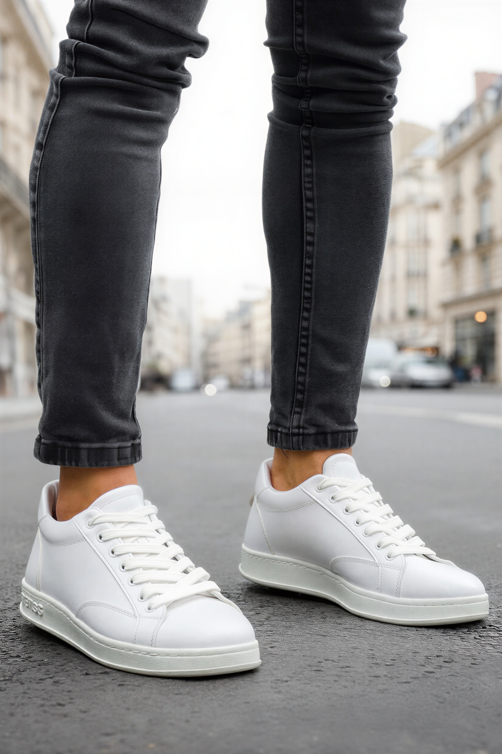 Men's white lace-up low sneakers, front and side angle pair.