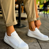 White low-top lace-up sneakers with smooth upper and white rubber sole