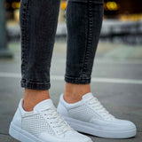 White lace-up sneakers with perforated side panels and white rubber sole