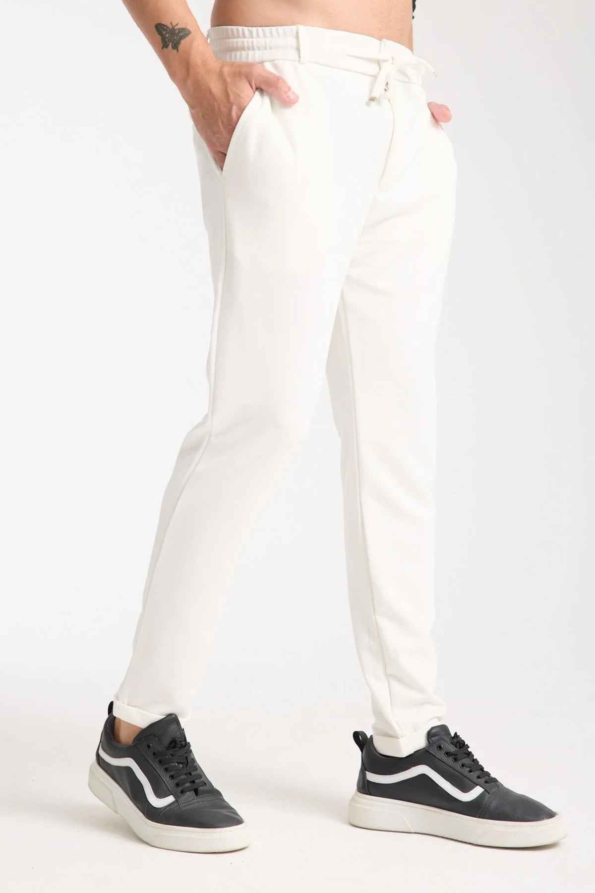 Men's Kaphone sweatpants in white with front tie at elastic waist and side seams