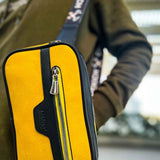 Men's yellow CH101 tablet bag with black trim and front zip pull