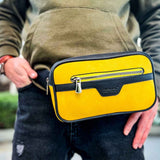 Men's yellow CH101 tablet bag front view with zipper and logo patch