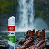 Water repellent spray bottle beside brown leather boots in rain
