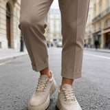 Beige suede men's sneakers with lace-up front and low rubber sole