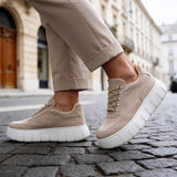 Men's beige suede lace-up sneakers, low-top profile, white sole and laces