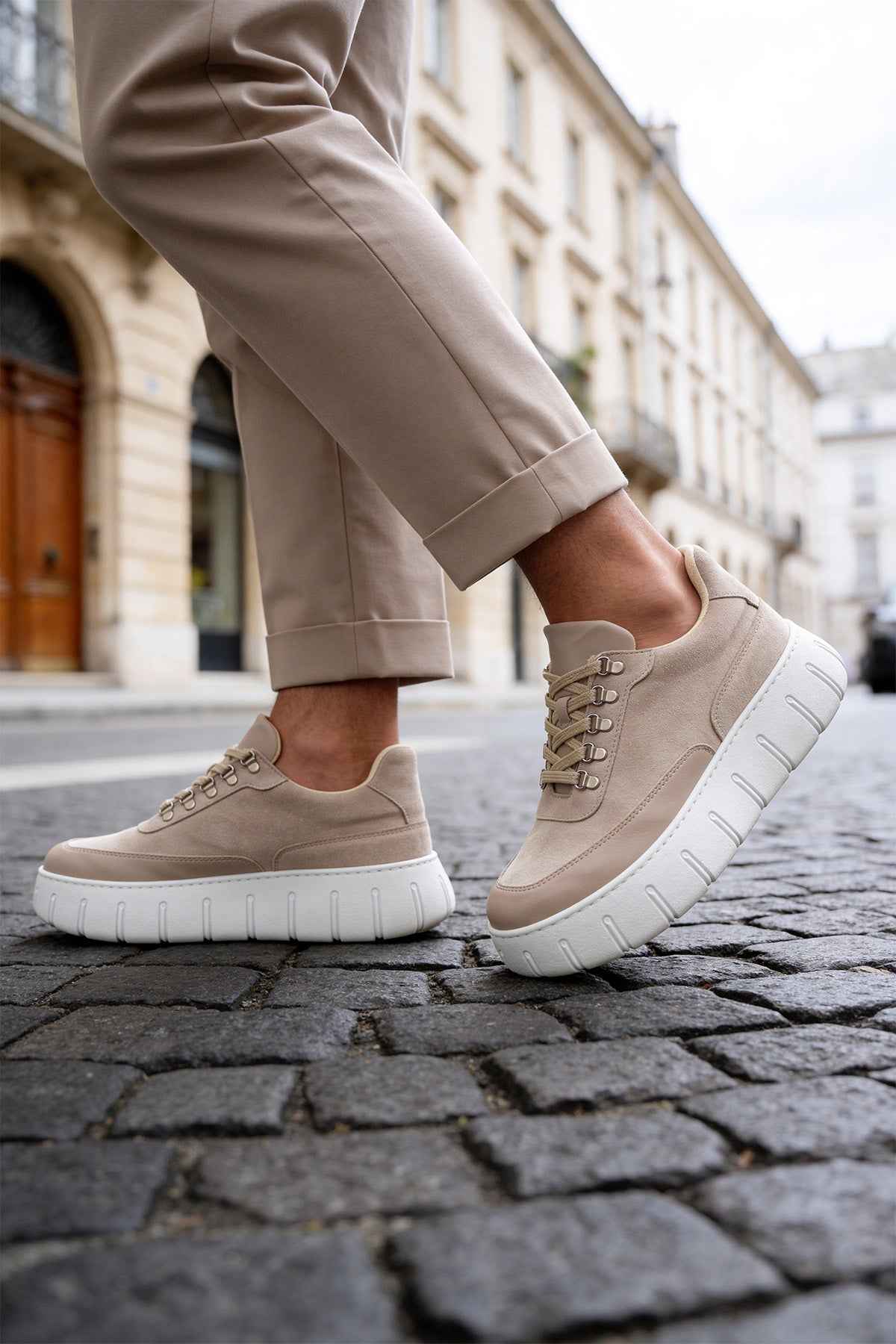Men's beige suede lace-up sneakers, low-top profile, white sole and laces